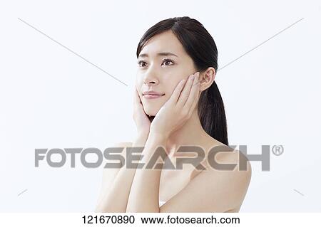 Young Japanese woman studio portrait View Large Photo Image Stock Image - Young Japanese woman studio portrait. Fotosearch