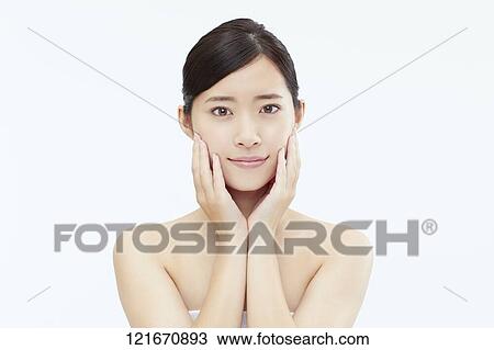 Young Japanese woman studio portrait View Large Photo Image Stock Image - Young Japanese woman studio portrait. Fotosearch
