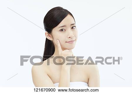 Young Japanese woman studio portrait View Large Photo Image Stock Image - Young Japanese woman studio portrait. Fotosearch