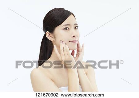 Young Japanese woman studio portrait View Large Photo Image Stock Image - Young Japanese woman studio portrait. Fotosearch