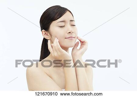 Young Japanese woman studio portrait View Large Photo Image Stock Image - Young Japanese woman studio portrait. Fotosearch