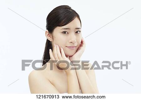 Young Japanese woman studio portrait View Large Photo Image Stock Image - Young Japanese woman studio portrait. Fotosearch