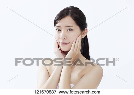 Stock Photo - Young Japanese woman studio portrait. Fotosearch