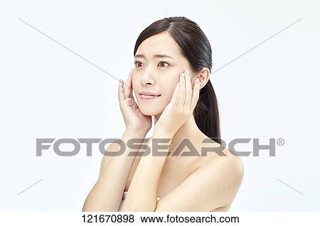 Young Japanese woman studio portrait View Large Photo Image Stock Photo - Young Japanese woman studio portrait. Fotosearch