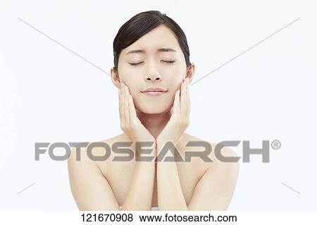 Young Japanese woman studio portrait View Large Photo Image Stock Photo - Young Japanese woman studio portrait. Fotosearch