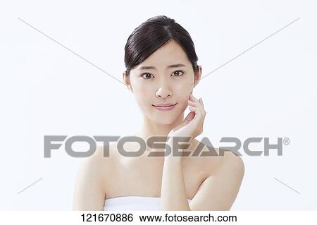 Young Japanese woman studio portrait View Large Photo Image Stock Photograph - Young Japanese woman studio portrait. Fotosearch