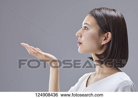 Young Japanese woman studio portrait View Large Photo Image Stock Photograph - Young Japanese woman studio portrait. Fotosearch