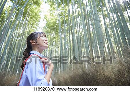 Young Japanese woman traveling in Kyoto View Large Photo Image Stock Image - Young Japanese woman traveling in Kyoto. Fotosearch
