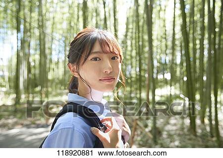 Young Japanese woman traveling in Kyoto View Large Photo Image Stock Image - Young Japanese woman traveling in Kyoto. Fotosearch