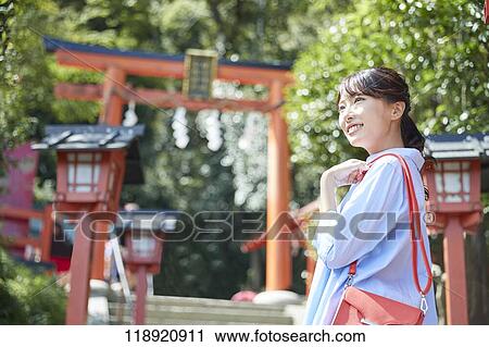 Young Japanese woman traveling in Kyoto View Large Photo Image Stock Image - Young Japanese woman traveling in Kyoto. Fotosearch