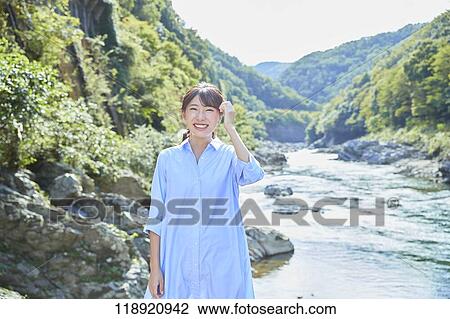 Young Japanese woman traveling in Kyoto View Large Photo Image Stock Image - Young Japanese woman traveling in Kyoto. Fotosearch
