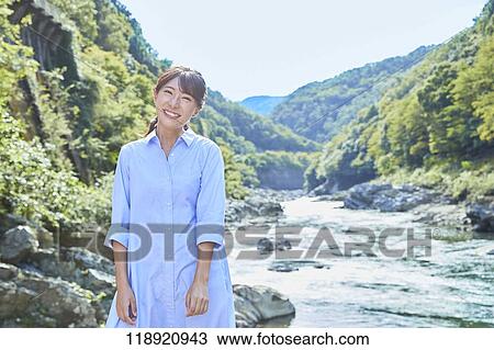 Young Japanese woman traveling in Kyoto View Large Photo Image Stock Image - Young Japanese woman traveling in Kyoto. Fotosearch