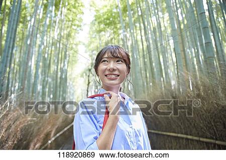 Stock Photo - Young Japanese woman traveling in Kyoto. Fotosearch