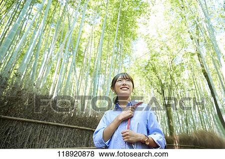 Stock Photo - Young Japanese woman traveling in Kyoto. Fotosearch