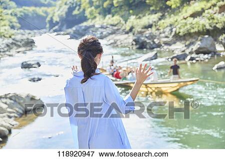 Stock Photo - Young Japanese woman traveling in Kyoto. Fotosearch