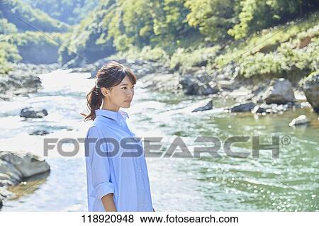 Young Japanese woman traveling in Kyoto View Large Photo Image Stock Photo - Young Japanese woman traveling in Kyoto. Fotosearch