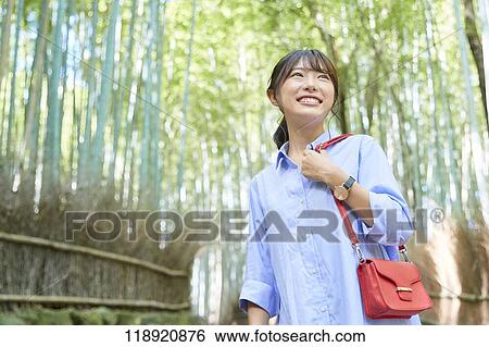 Young Japanese woman traveling in Kyoto View Large Photo Image Stock Photograph - Young Japanese woman traveling in Kyoto. Fotosearch