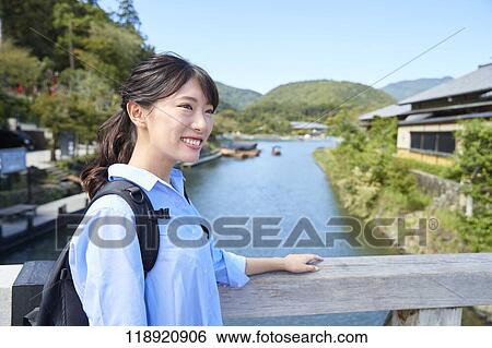 Young Japanese woman traveling in Kyoto View Large Photo Image Stock Photograph - Young Japanese woman traveling in Kyoto. Fotosearch