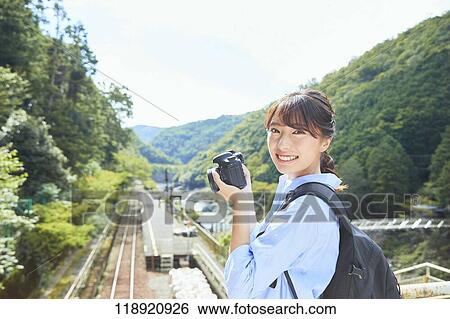 Young Japanese woman traveling in Kyoto View Large Photo Image Stock Photograph - Young Japanese woman traveling in Kyoto. Fotosearch