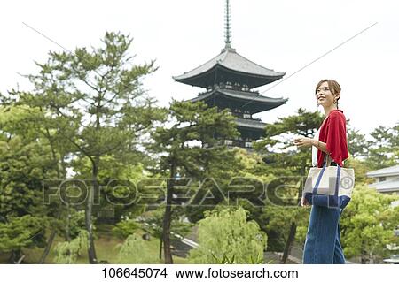 Young Japanese woman visiting Nara View Large Photo Image Picture - Young Japanese woman visiting Nara. Fotosearch