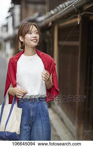 Young Japanese woman visiting Nara View Large Photo Image Picture - Young Japanese woman visiting Nara. Fotosearch