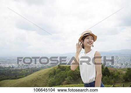 Young Japanese woman visiting Nara View Large Photo Image Picture - Young Japanese woman visiting Nara. Fotosearch