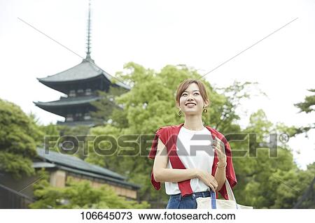 Young Japanese woman visiting Nara View Large Photo Image Stock Image - Young Japanese woman visiting Nara. Fotosearch