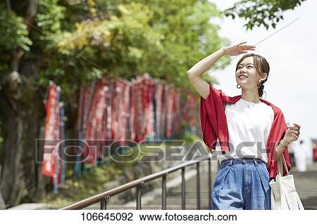 Young Japanese woman visiting Nara View Large Photo Image Stock Image - Young Japanese woman visiting Nara. Fotosearch