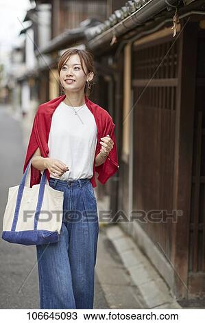 Young Japanese woman visiting Nara View Large Photo Image Stock Image - Young Japanese woman visiting Nara. Fotosearch