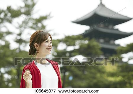 Young Japanese woman visiting Nara View Large Photo Image Stock Photo - Young Japanese woman visiting Nara. Fotosearch