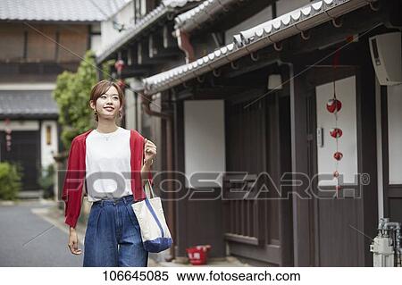 Young Japanese woman visiting Nara View Large Photo Image Stock Photography - Young Japanese woman visiting Nara. Fotosearch