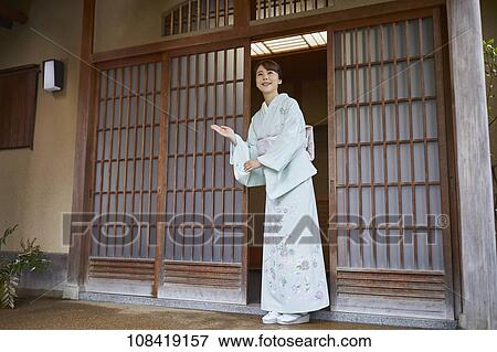 Stock Photo - Young Japanese woman wearing traditional kimono. Fotosearch