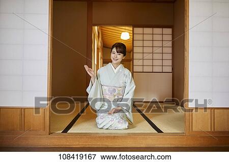 Stock Photo - Young Japanese woman wearing traditional kimono. Fotosearch