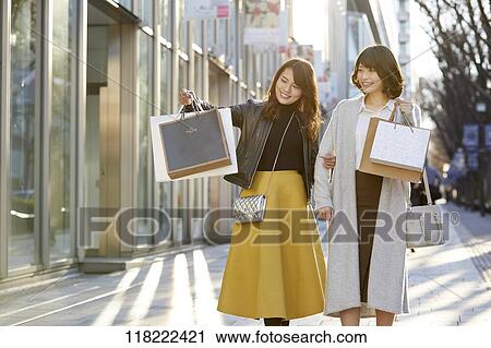 Young Japanese women downtown Tokyo View Large Photo Image Stock Image - Young Japanese women downtown Tokyo. Fotosearch