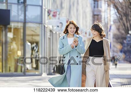 Young Japanese women downtown Tokyo View Large Photo Image Stock Photo - Young Japanese women downtown Tokyo. Fotosearch