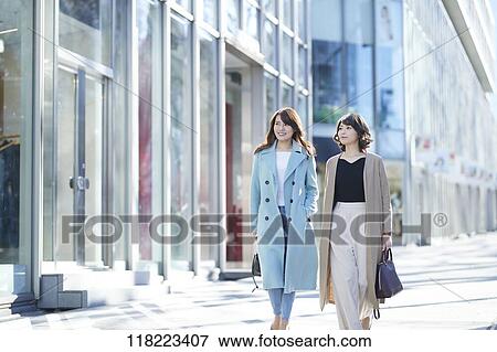 Stock Photo - Young Japanese women downtown Tokyo. Fotosearch