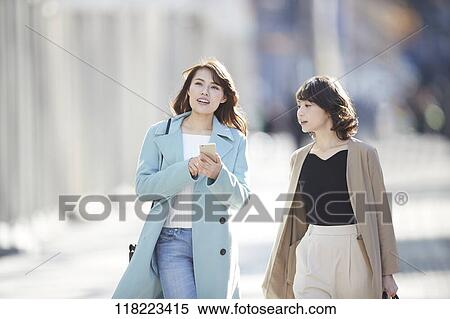 Young Japanese women downtown Tokyo View Large Photo Image Stock Photography - Young Japanese women downtown Tokyo. Fotosearch