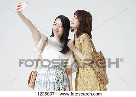 Stock Image - Young Japanese women portrait. Fotosearch