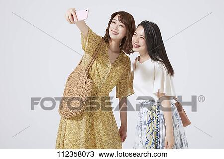 Stock Image - Young Japanese women portrait. Fotosearch