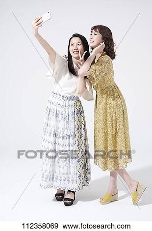 Stock Photo - Young Japanese women portrait. Fotosearch