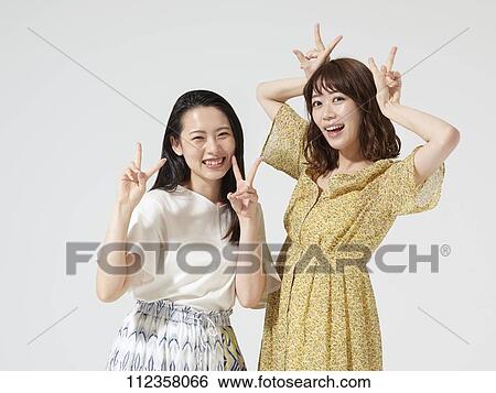 Young Japanese women portrait View Large Photo Image Stock Photograph - Young Japanese women portrait. Fotosearch