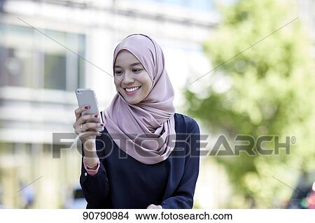 Young South-east Asian businesswoman View Large Photo Image Picture - Young South-east Asian businesswoman. Fotosearch