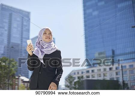 Young South-east Asian businesswoman View Large Photo Image Picture - Young South-east Asian businesswoman. Fotosearch