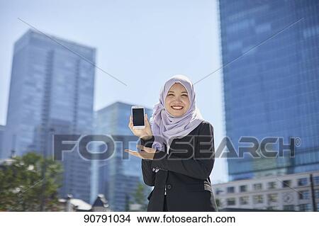 Young South-east Asian businesswoman View Large Photo Image Picture - Young South-east Asian businesswoman. Fotosearch