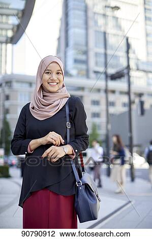 Young South-east Asian businesswoman View Large Photo Image Stock Image - Young South-east Asian businesswoman. Fotosearch