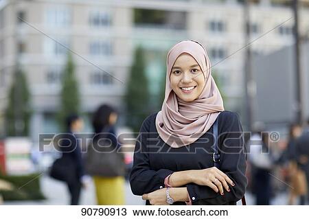 Stock Image - Young South-east Asian businesswoman. Fotosearch