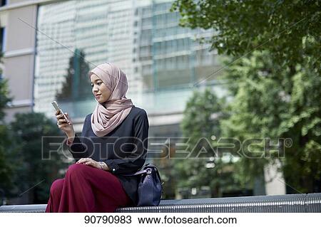 Stock Image - Young South-east Asian businesswoman. Fotosearch