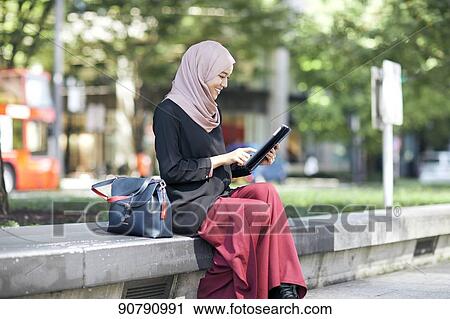 Young South-east Asian businesswoman View Large Photo Image Stock Image - Young South-east Asian businesswoman. Fotosearch