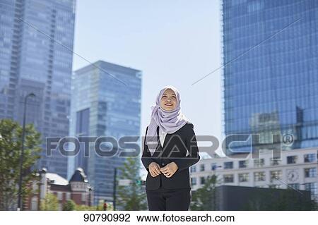 Young South-east Asian businesswoman View Large Photo Image Stock Image - Young South-east Asian businesswoman. Fotosearch