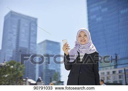 Young South-east Asian businesswoman View Large Photo Image Stock Image - Young South-east Asian businesswoman. Fotosearch